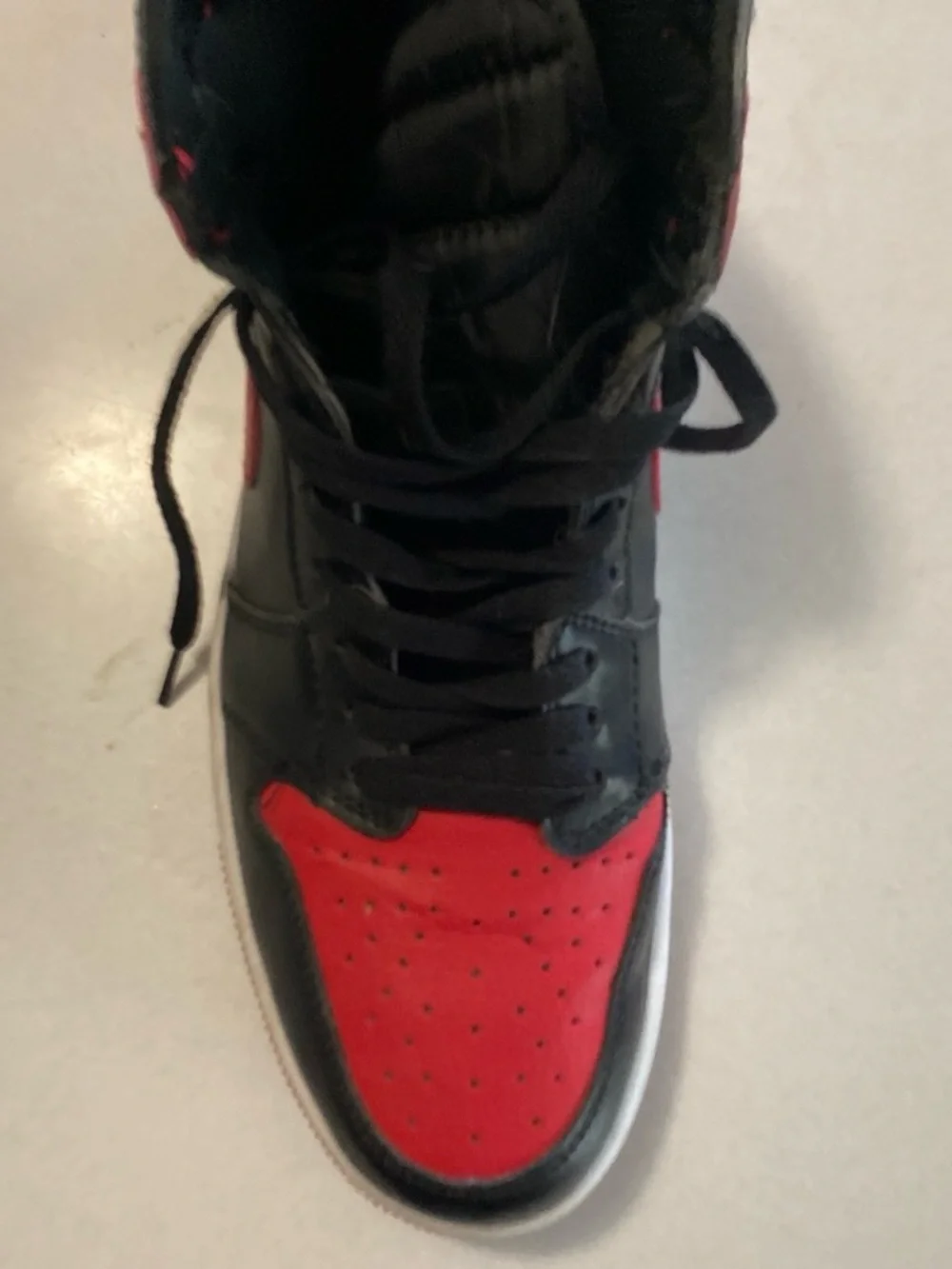 Jordan High-Top Sneakers in Black and Red